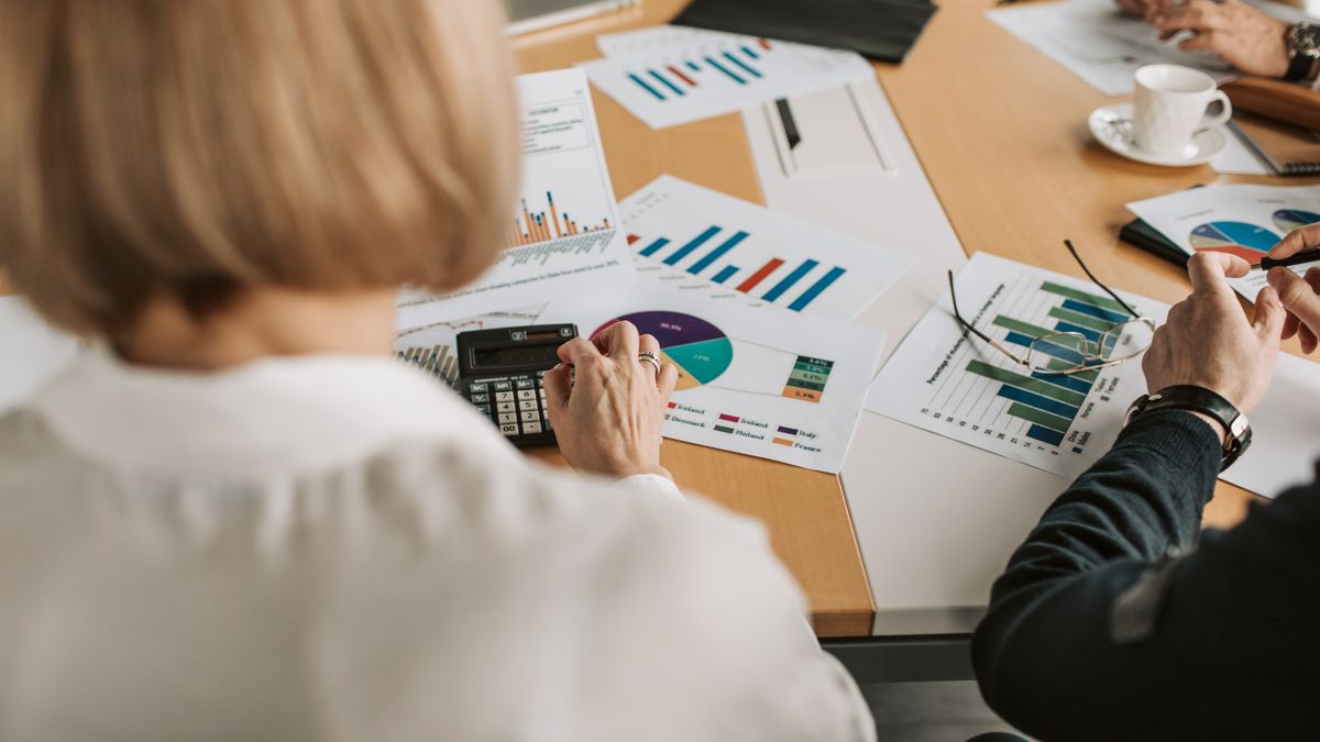 Service member reviewing a transition budget with a financial counselor