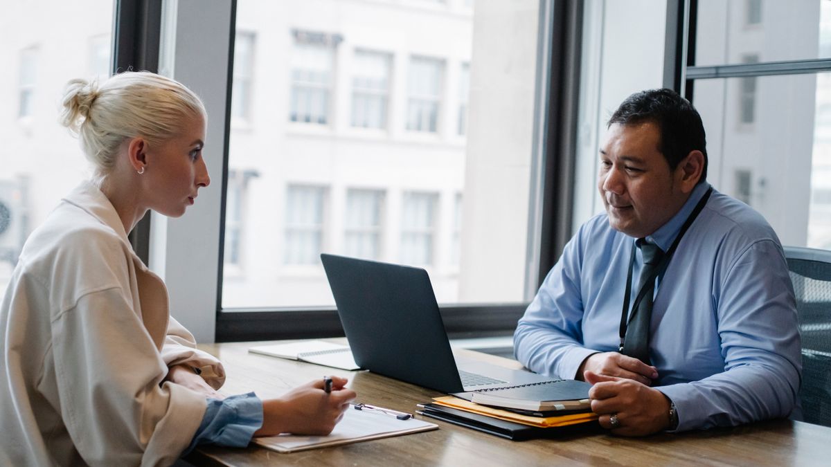 veteran candidate discussing a civilian job offer with a hiring manager
