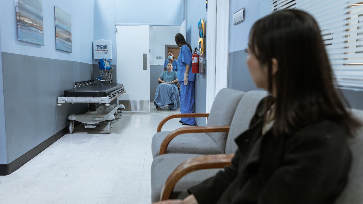 Military applicants seated in a medical processing waiting room