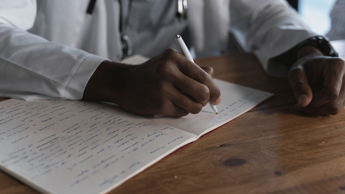 Medical records and prescription documents organized on a desk