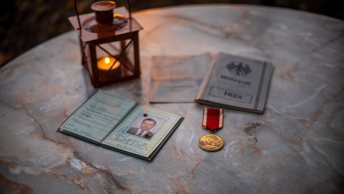 military retiree standing at an installation identification card office