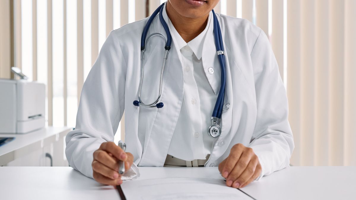 Veteran reviewing symptom notes before a medical examination