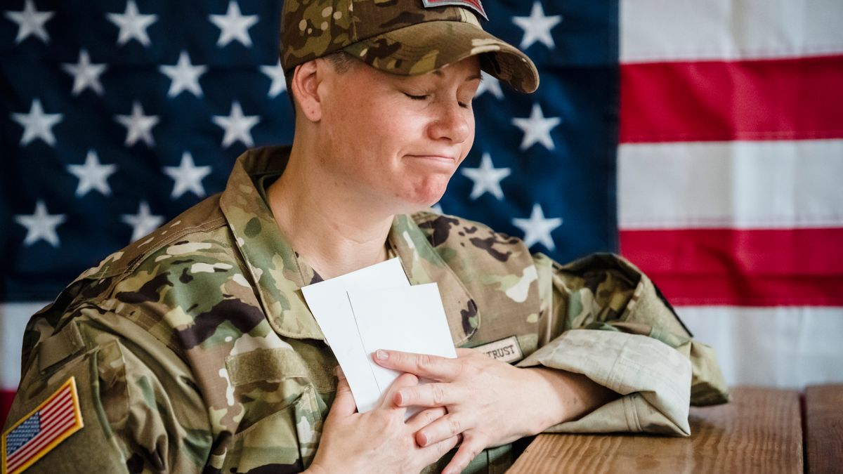 Veteran reviewing a VA decision letter and marking denial reasons