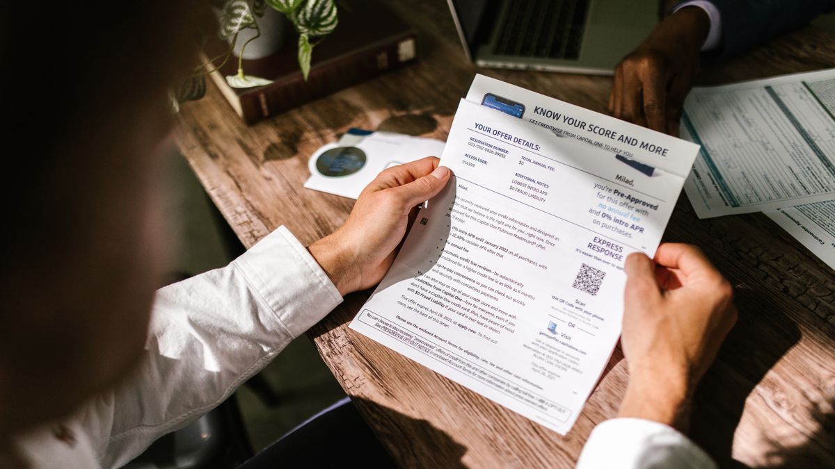 Veteran reviewing a VA decision letter and deadline notes at home