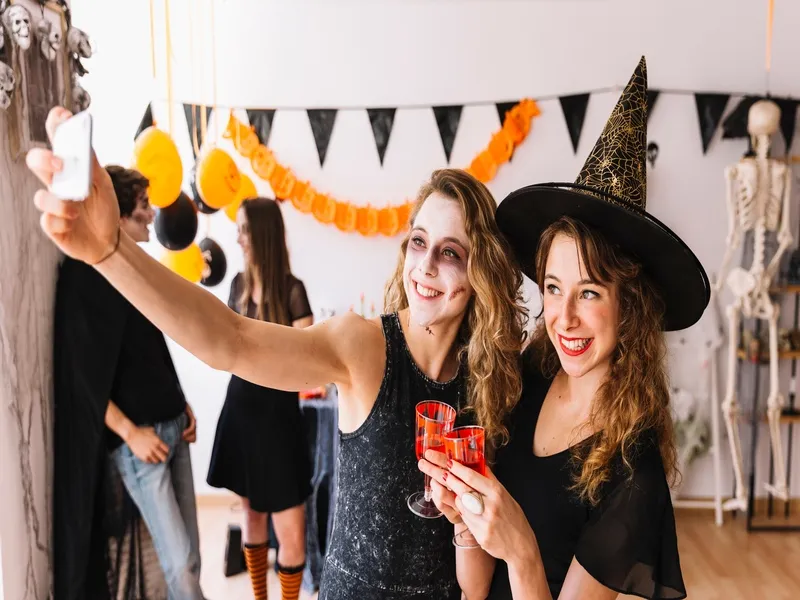 women-use-free-phone-take-photo-halloween