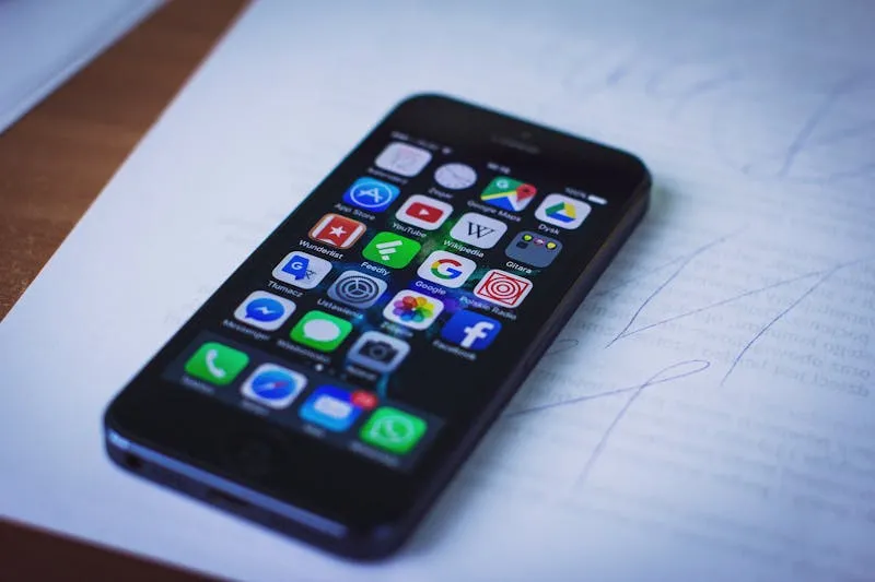 how to find sim number on iphone