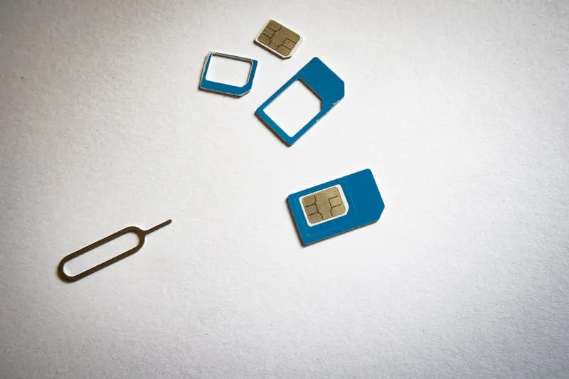 how to find sim number on iphone